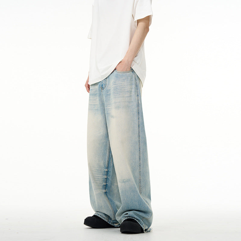 Jake – Water Washed Wide Jeans with Distressed Details