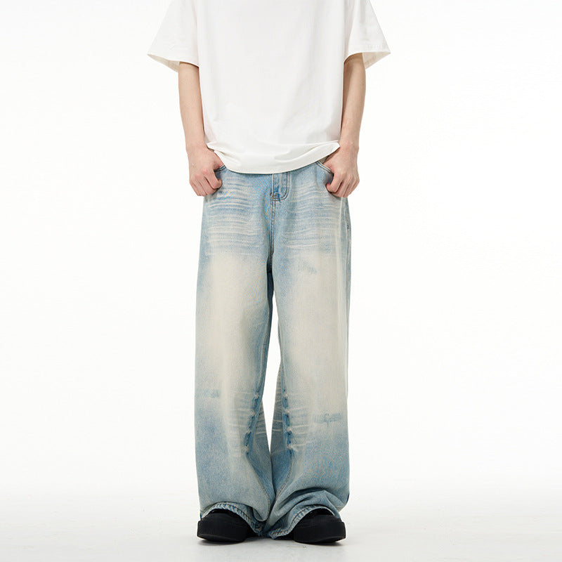 Jake – Water Washed Wide Jeans with Distressed Details